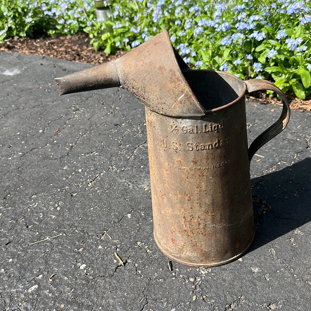 Antique oil can